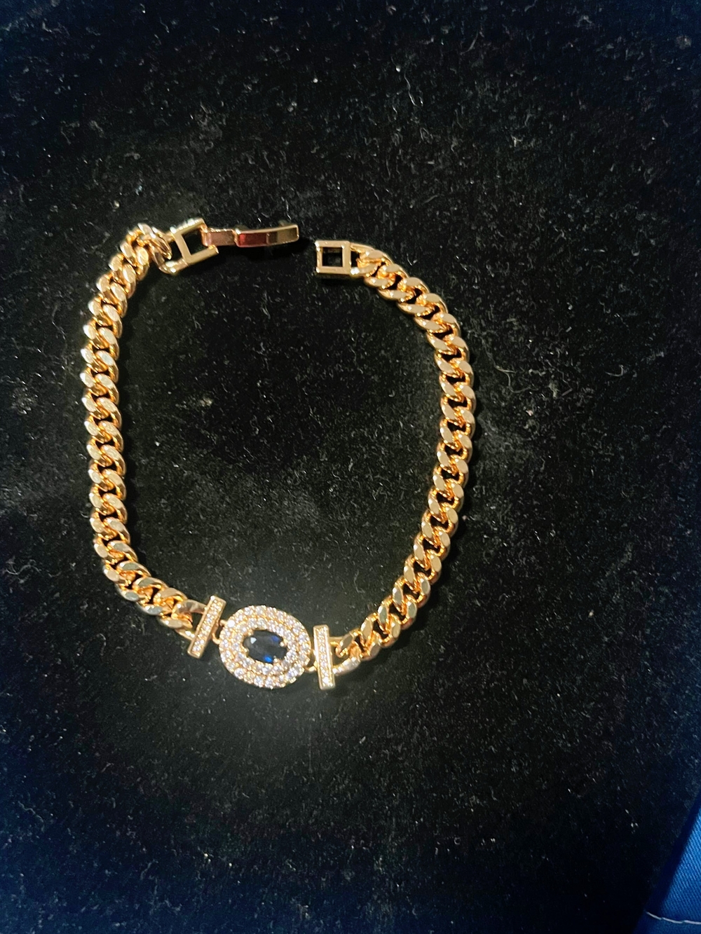 Gold-Tone Chain Bracelet with Blue Stone Center